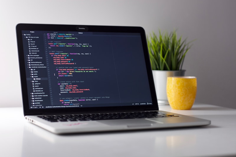 Developer working on a laptop with cloud desktop