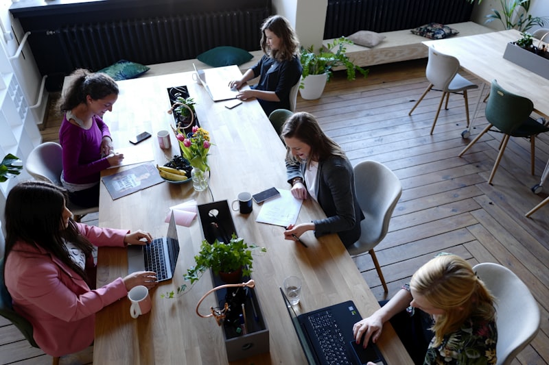 Professional support team assisting with technology migration